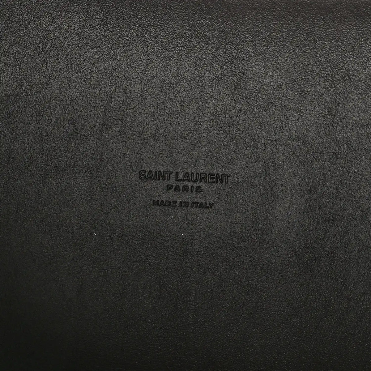 Leather hobo bag exterior with embossed Saint Laurent Paris logo text