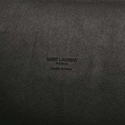 Leather hobo bag exterior with embossed Saint Laurent Paris logo text