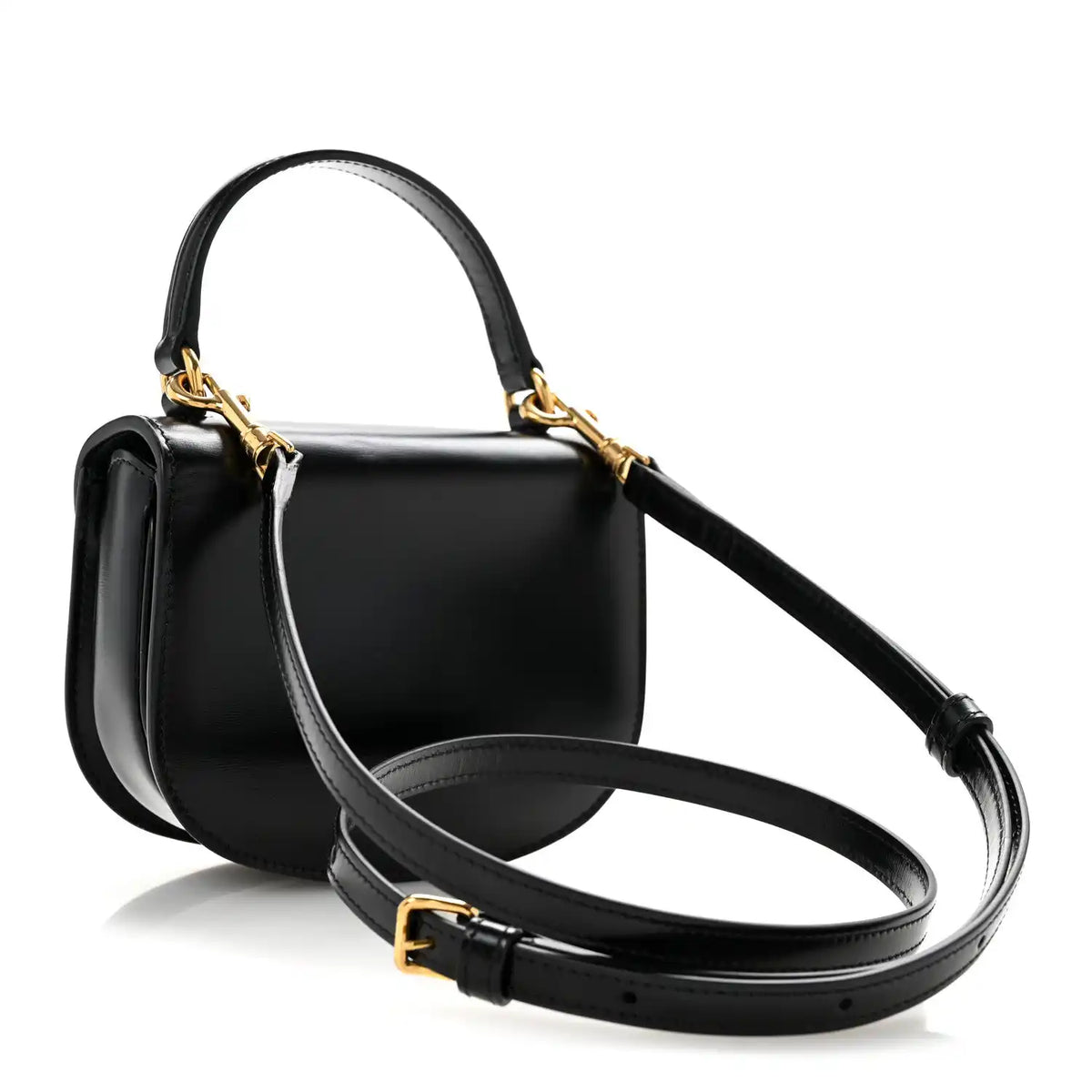 Black shiny mini crossbody bag with adjustable crossbody strap and gold-tone hardware