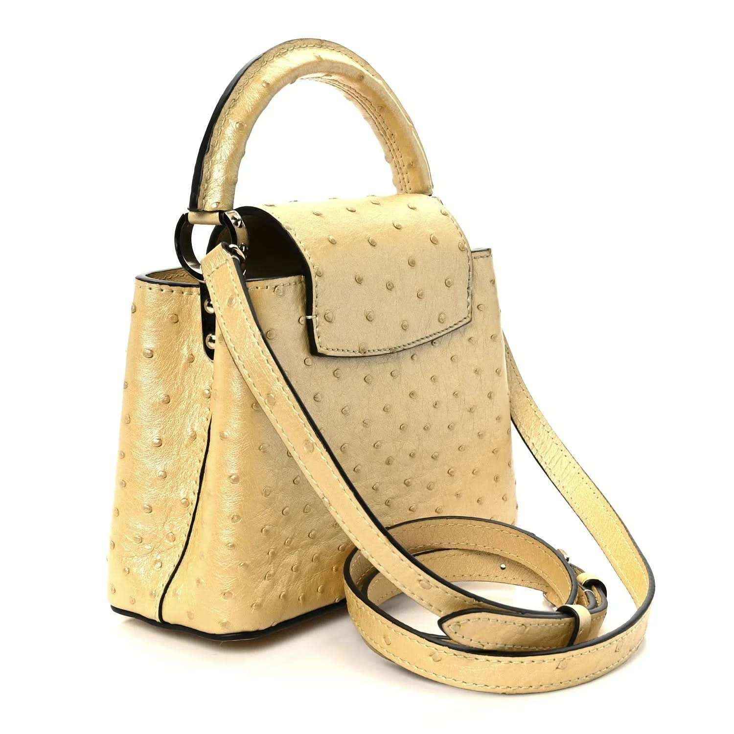 Yellow mini top-handle bag with shoulder strap and front flap with LV emblem