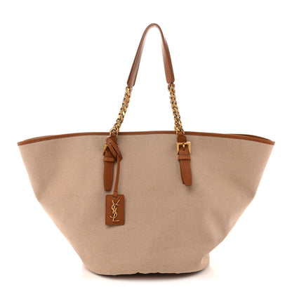 Desert dust canvas tote with brown leather straps and gold chain handle