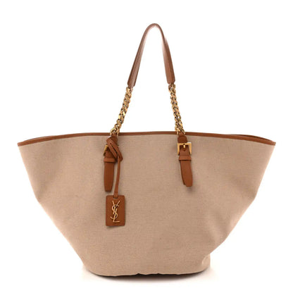 Desert dust canvas tote with brown leather straps and gold chain handle