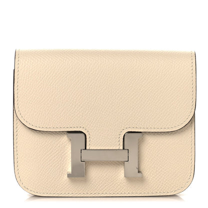 Slim Constance wallet in Nata textured leather with front clasp detail