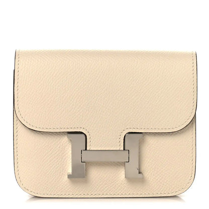 Slim Constance wallet in Nata textured leather with front clasp detail