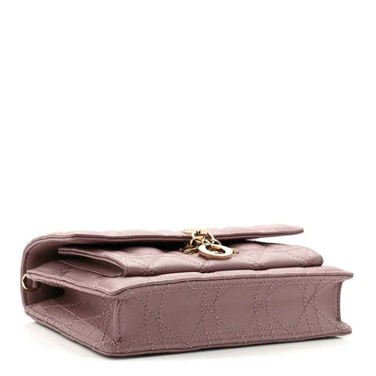 Purple quilted leather Lady Dior chain pouch bag with flap, top handle, and clasp