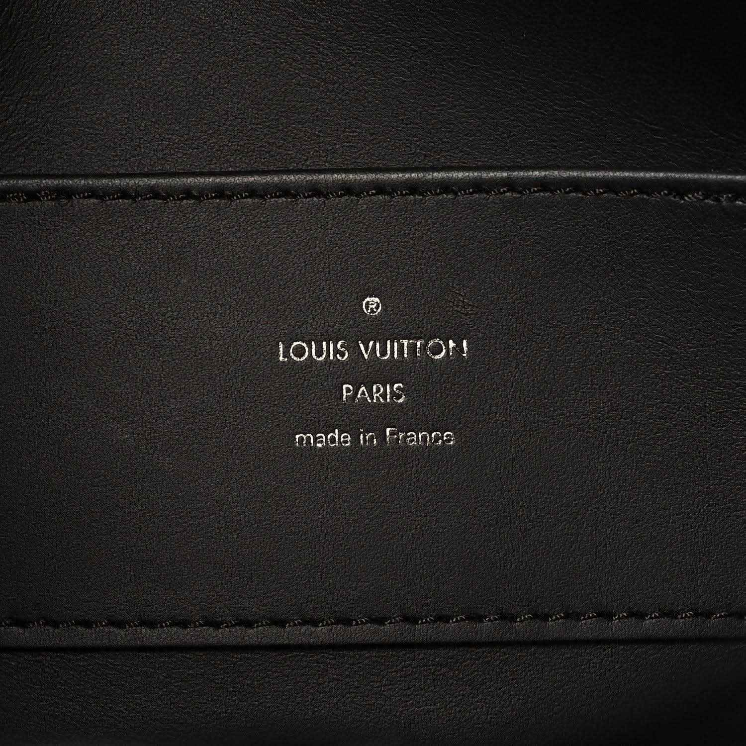 Black leather handbag interior label with Louis Vuitton Paris and made in France