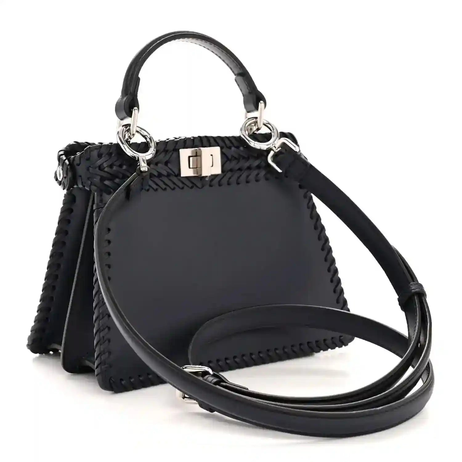 Midnight blue leather petite satchel with woven texture, ring handles and crossbody strap