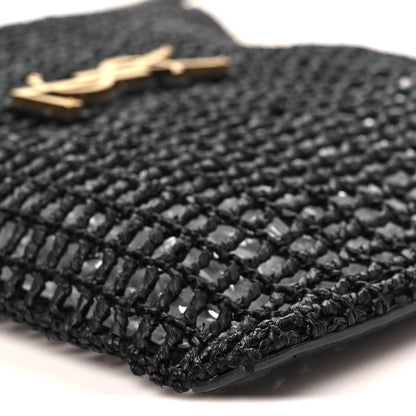 Black netted raffia weave with gold hardware on shoulder bag
