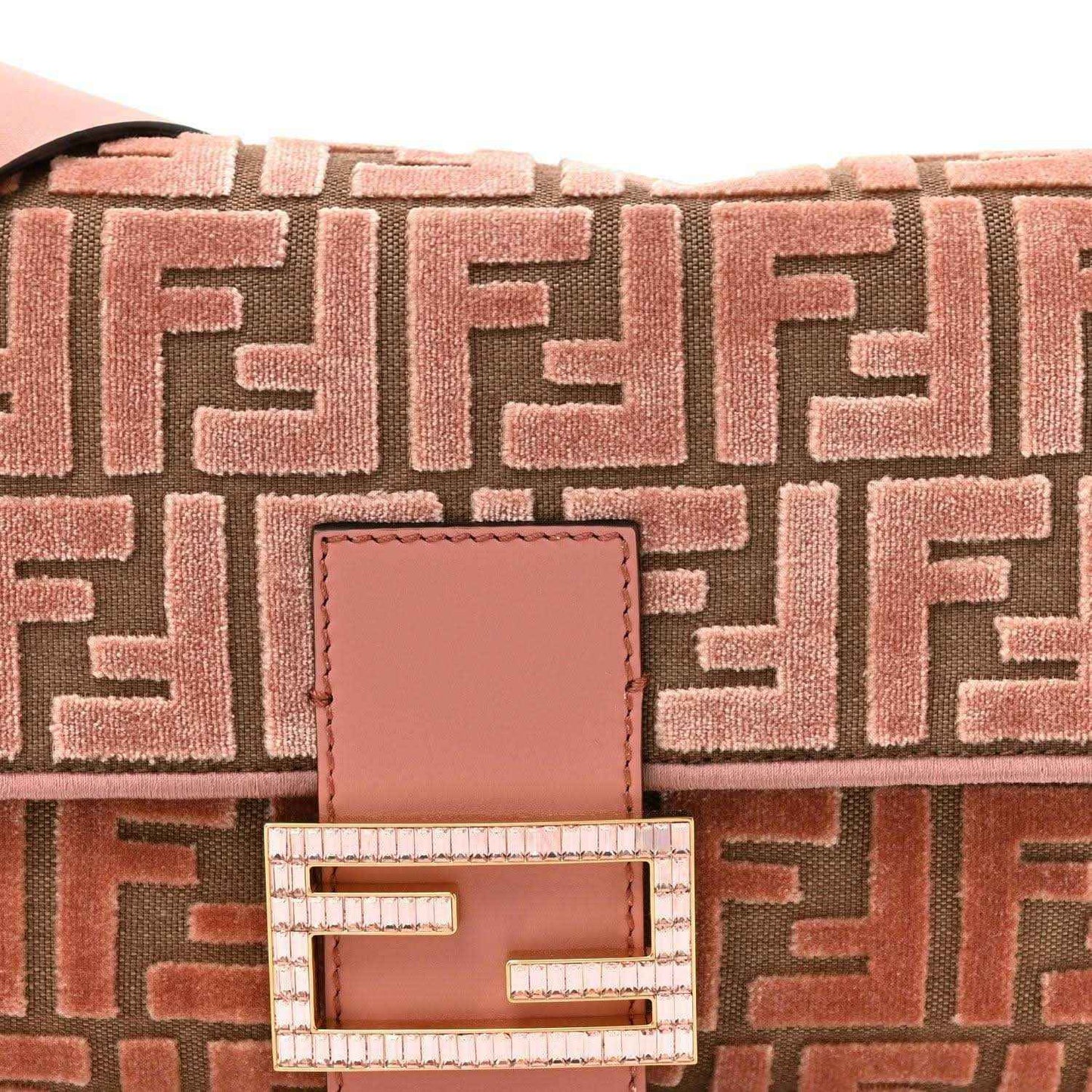 Fendi baguette bag close-up of macaron pink FF pattern and crystal FF clasp