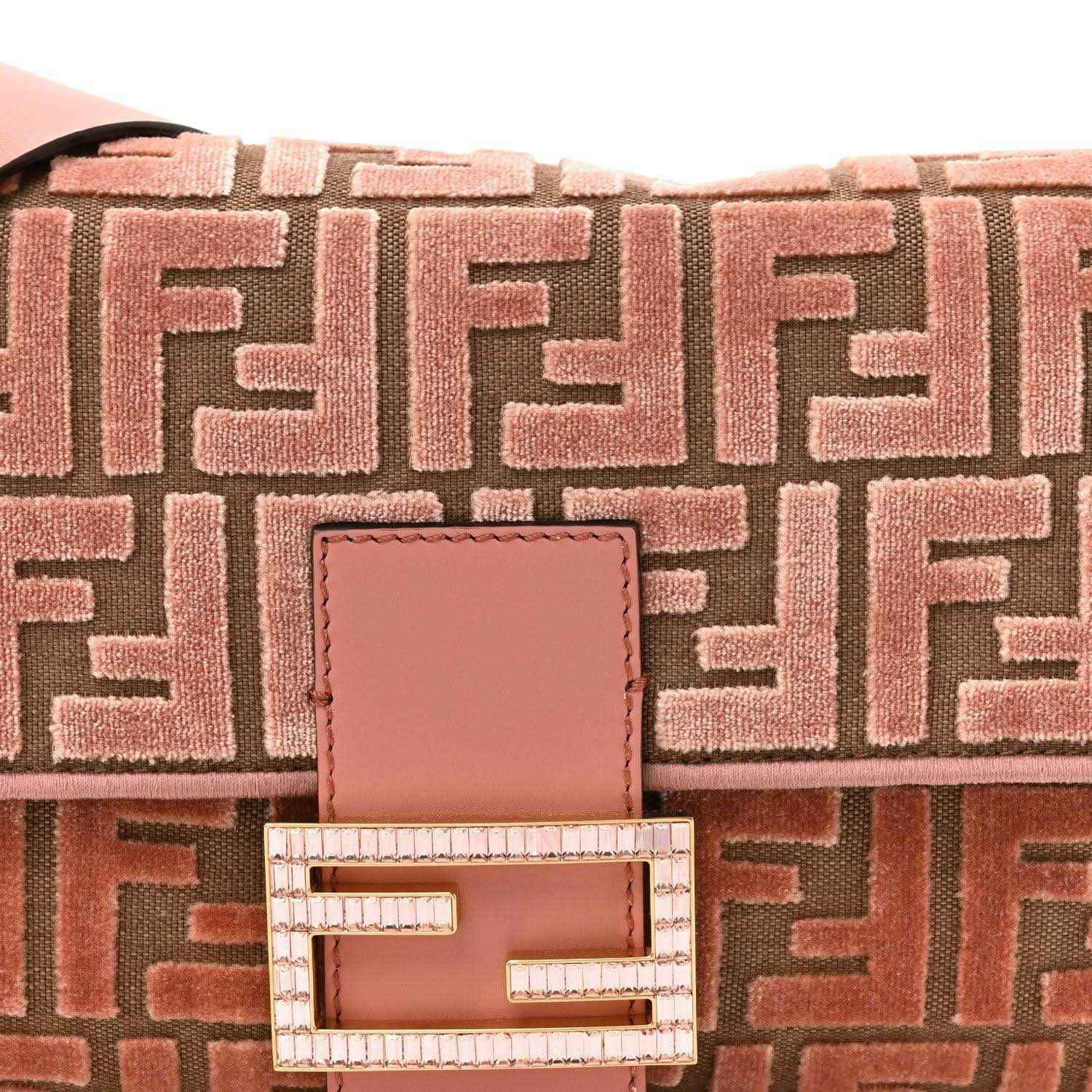 Fendi baguette bag close-up of macaron pink FF pattern and crystal FF clasp