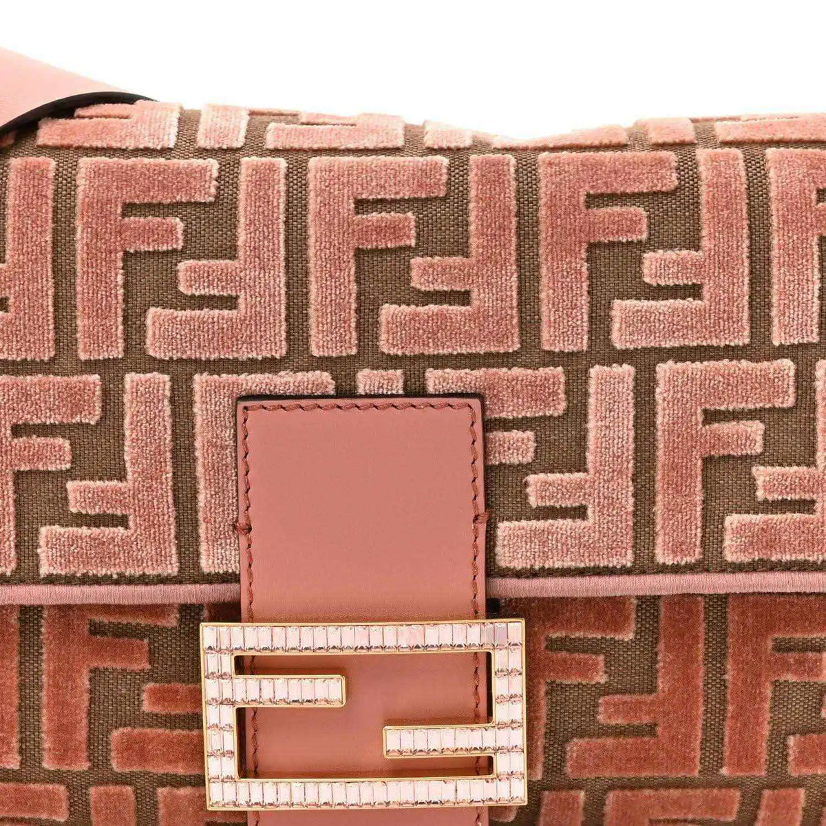 Fendi baguette bag close-up of macaron pink FF pattern and crystal FF clasp