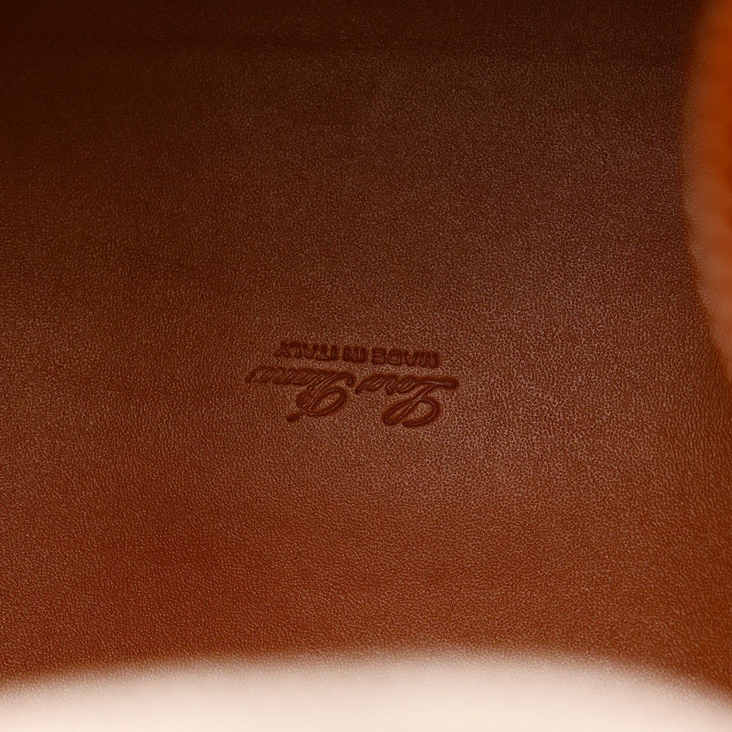 Tan leather lining with subtle Loro Piana logo emboss.