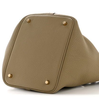 Beige leather Picotin 22 tote with gold-tone corner studs and front panel seam
