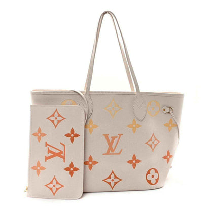 Neutral tote with matching monogram print, front pocket, and top handles