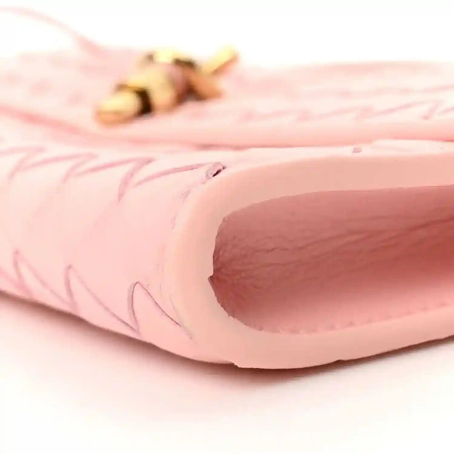 Rose pink nappa leather clutch interior opening and edge stitching