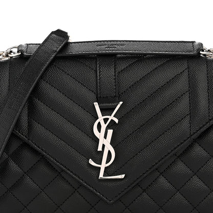Black quilted satchel with YSL logo plaque and diagonal stitch detailing