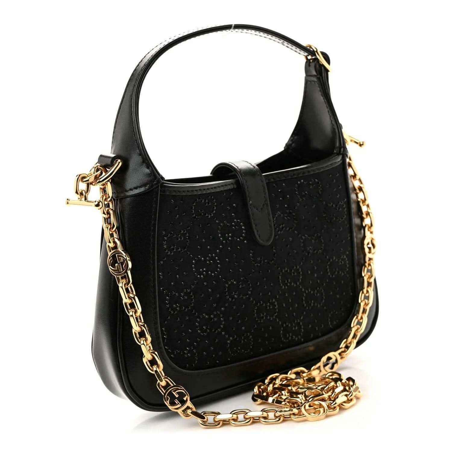 Black hobo bag with gold chain crossbody strap and embossed monogram-style pattern.