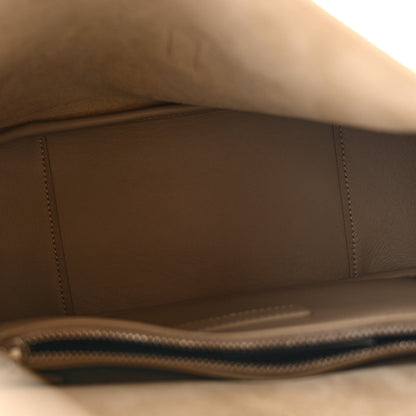 Small hobo bag interior with smooth beige lining and stitched edge