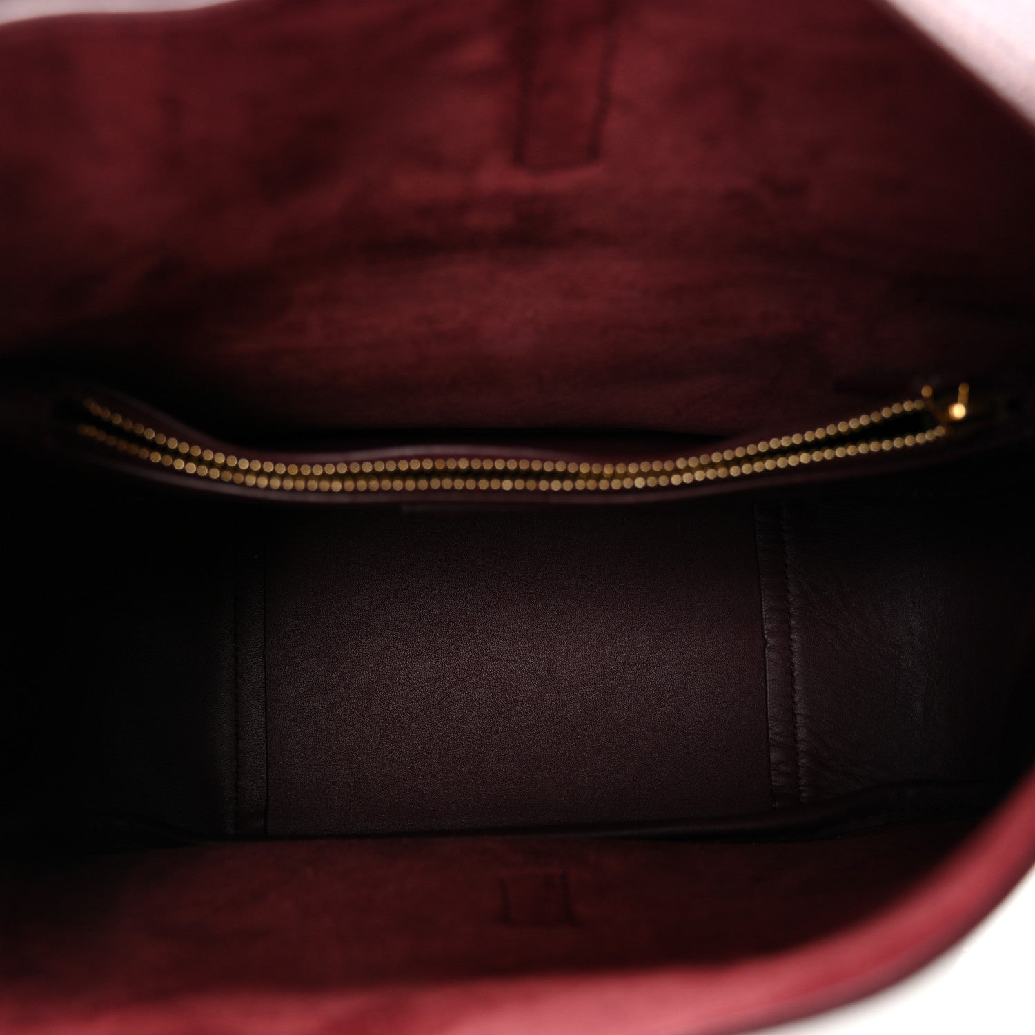 Burgundy leather hobo bag interior with gold-tone zipper trim