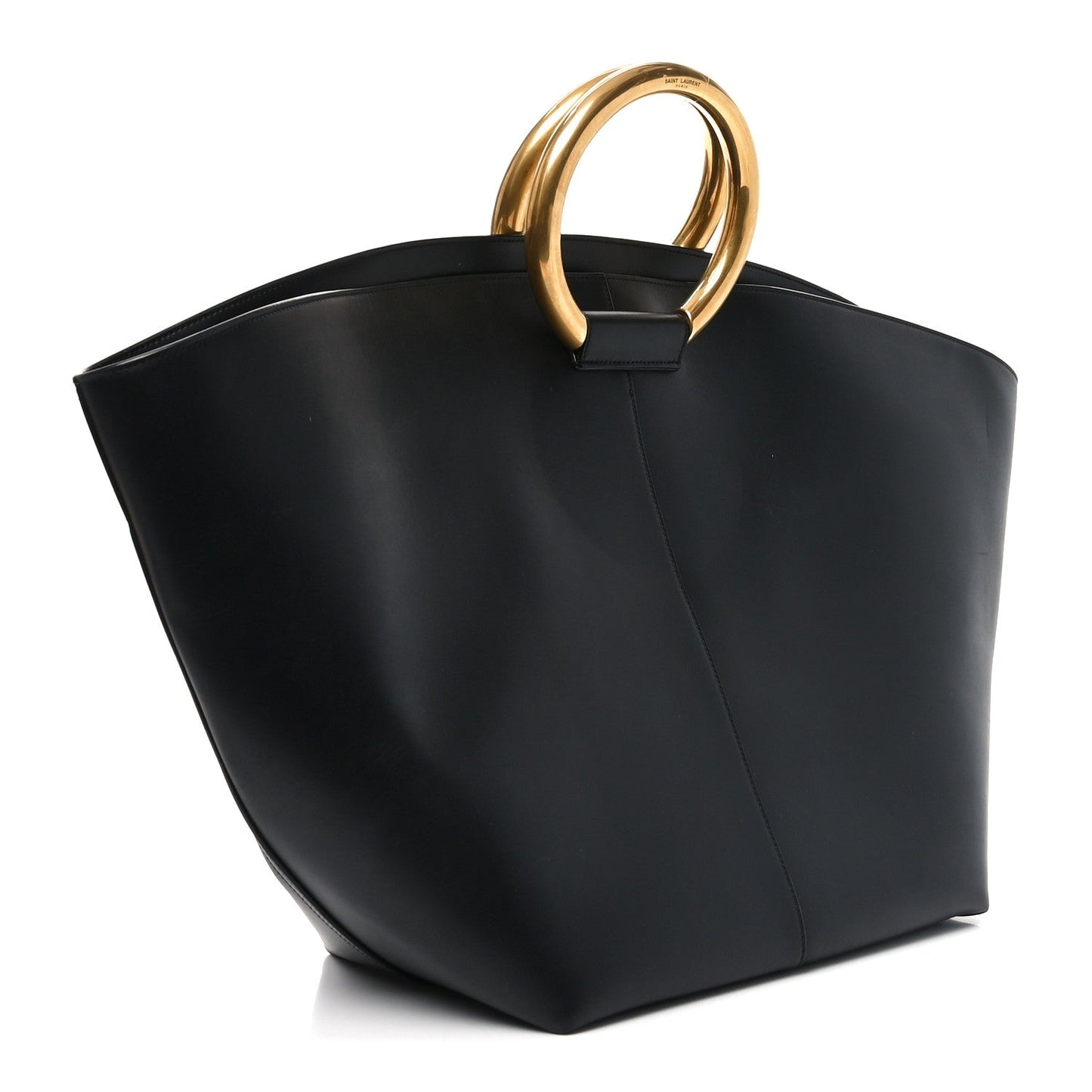 Black smooth calfskin maxi trapezoid tote with gold ring handle, angled view