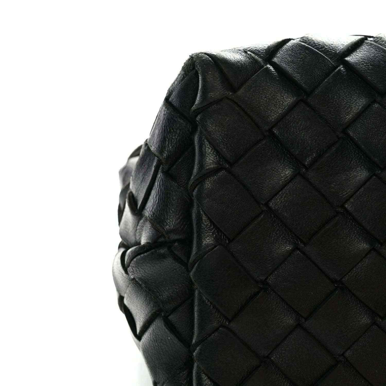 Black leather shoulder bag with intrecciato nappa weave and rounded side