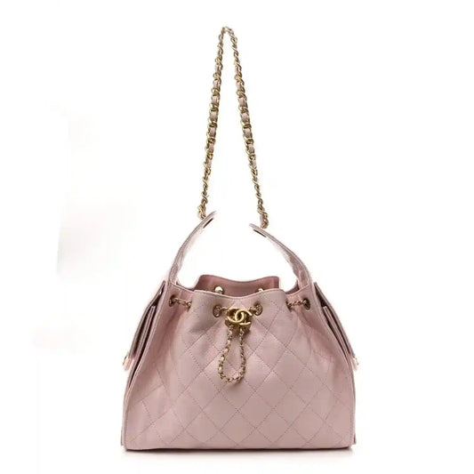 Chanel light pink quilted caviar small shoulder handbag with gold chain handles