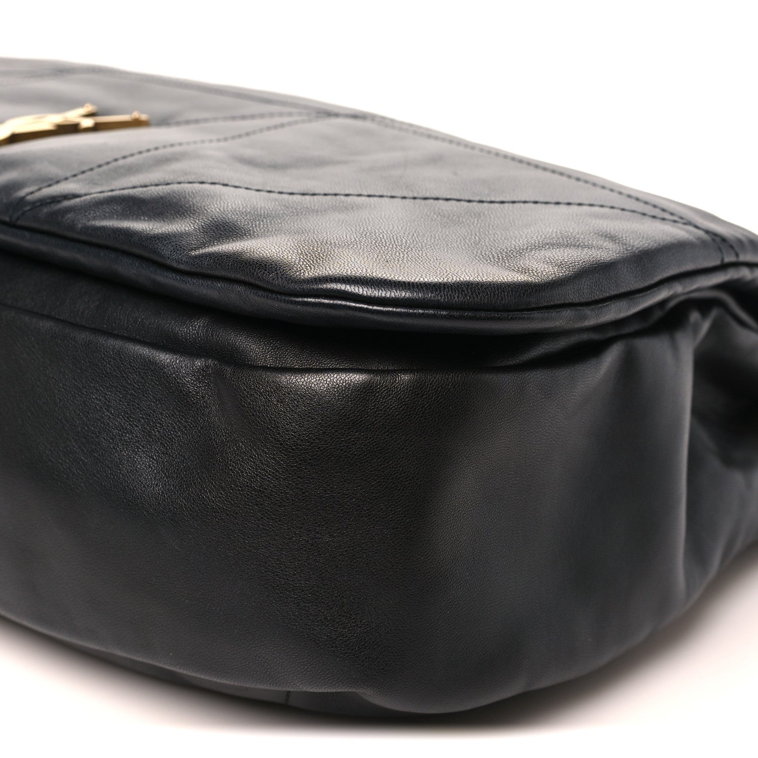 Black lambskin shoulder bag side with smooth panel and subtle quilting seams