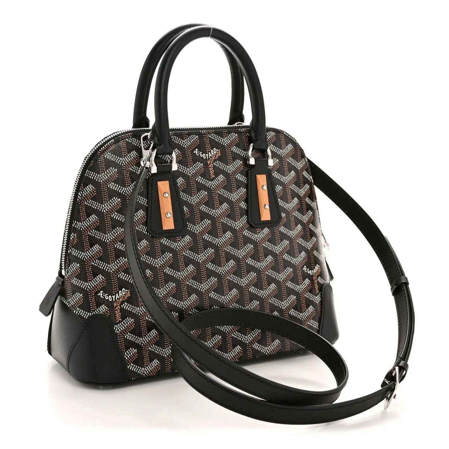 Mini handbag with monogram canvas, black top handles, and adjustable crossbody strap