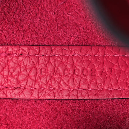 Rose pink embossed leather panel with stamped logo