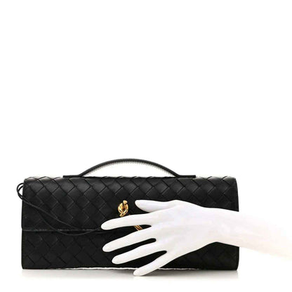 Bottega Veneta intrecciato leather top-handle clutch, black, gold clasp with hand