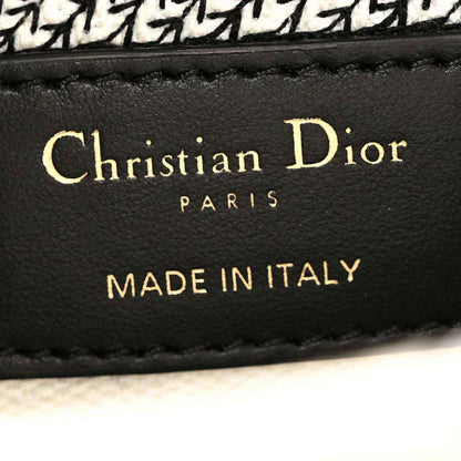 Christian Dior leather label on handbag interior: “Christian Dior PARIS”, “Made in Italy”