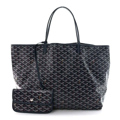 Navy Goyardine tote bag with top handles and matching card holder attached.