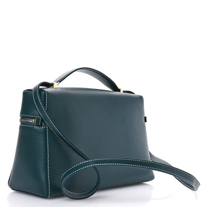 Petrolio teal smooth leather bag with adjustable shoulder strap and front zipper