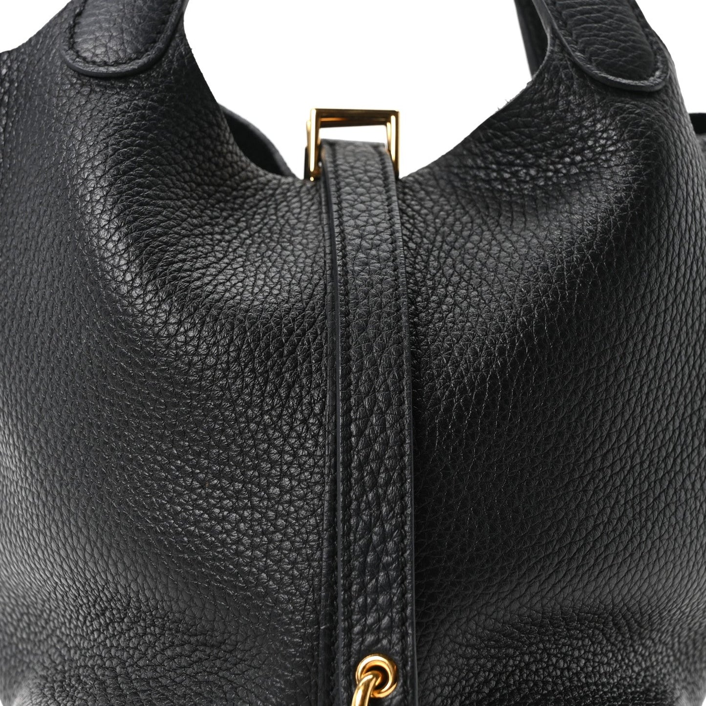 Black leather tote bag top with zipper pull and gold-tone hardware