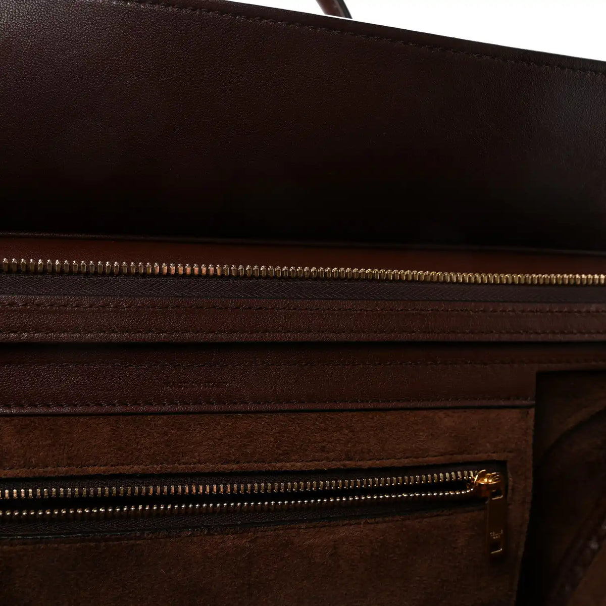 Celine lambskin handbag front pocket with gold-toned zipper and dual stitch lines