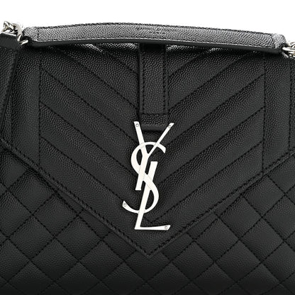 Black quilted satchel front with YSL monogram logo on the flap