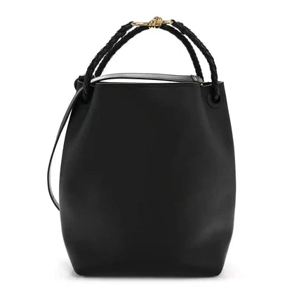 Black bucket bag in silky calfskin with braided top handles and shoulder strap