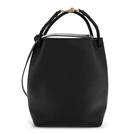 Black bucket bag in silky calfskin with braided top handles and shoulder strap