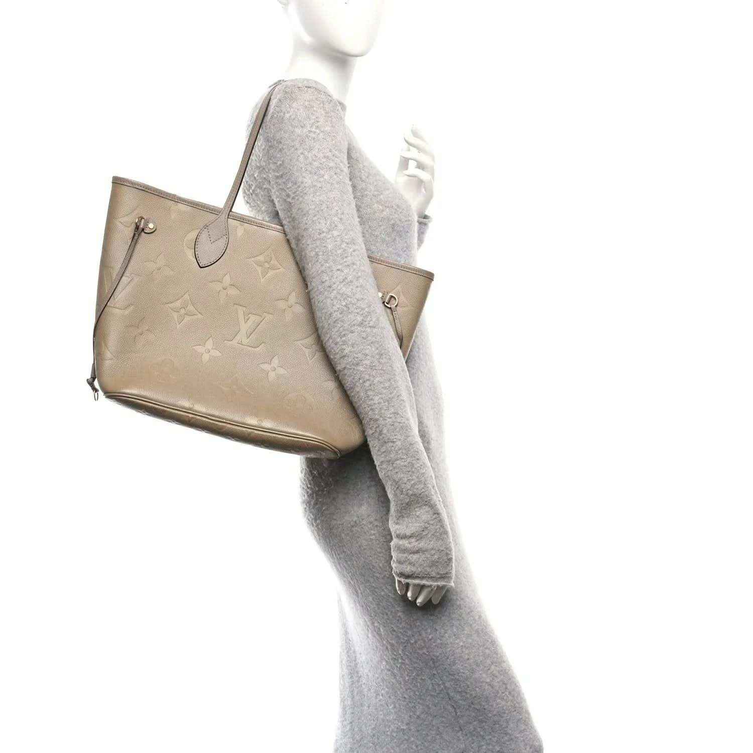 Louis Vuitton Neverfull MM tote bag, side view, with long fabric strap attached