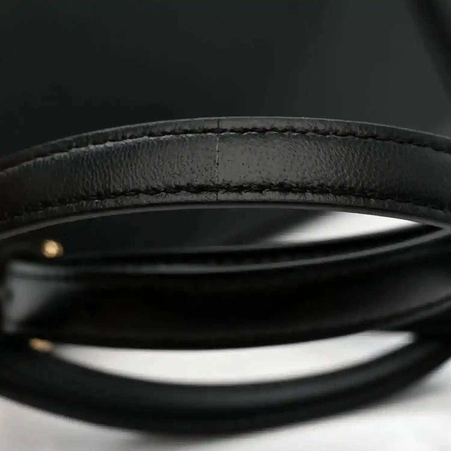 Black shiny nappa leather satchel top handle strap edge with stitching
