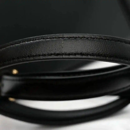 Black shiny nappa leather satchel top handle strap edge with stitching