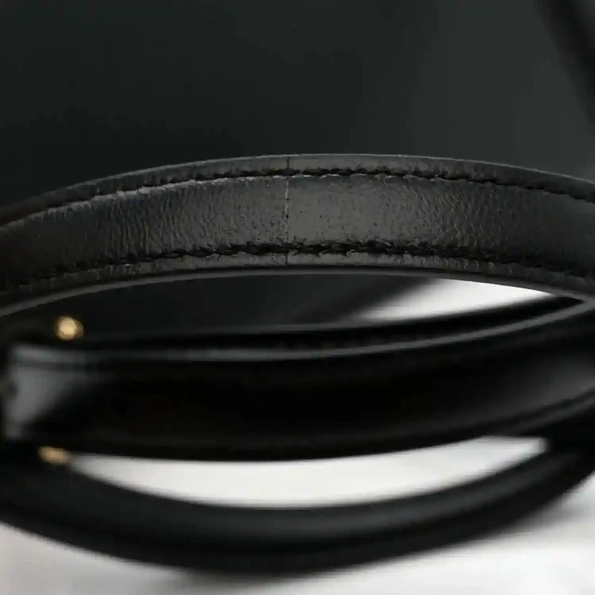 Black shiny nappa leather satchel top handle strap edge with stitching