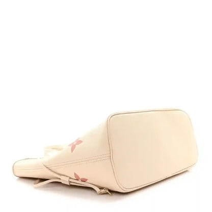 Louis Vuitton Neverfull MM tote bag bottom side view, creme with rose monogram accents