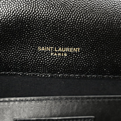 Black leather satchel with “SAINT LAURENT PARIS” embossing