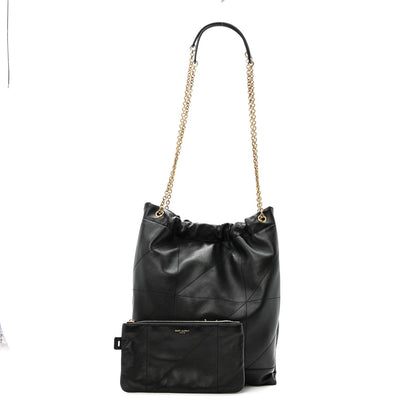 Black quilted leather drawstring bag with gold chain and attached zip pouch