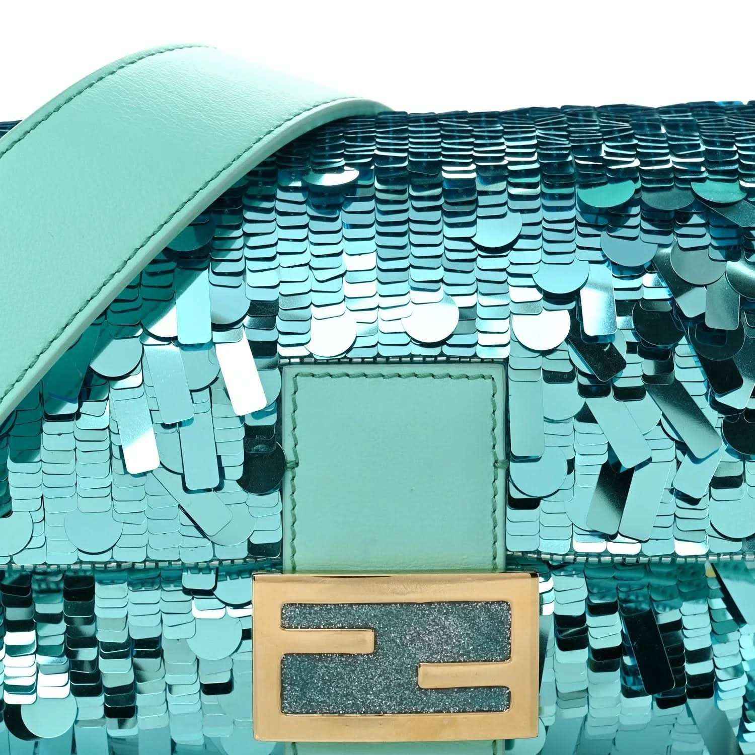 Turquoise sequin baguette bag with front F-shaped gold-tone clasp and leather flap