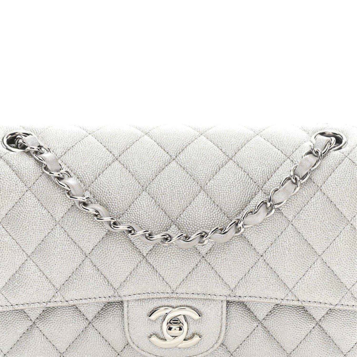 Chanel quilted silver double flap bag front close-up with CC turn-lock and chain