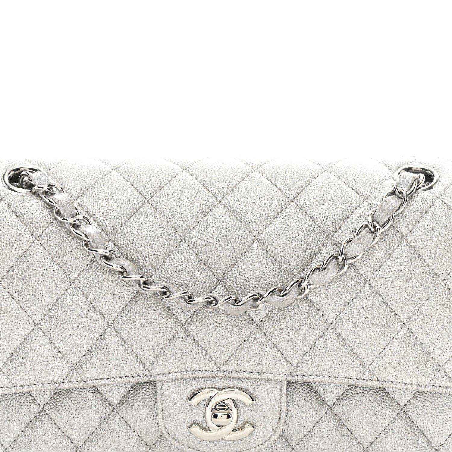 Chanel quilted silver double flap bag front close-up with CC turn-lock and chain