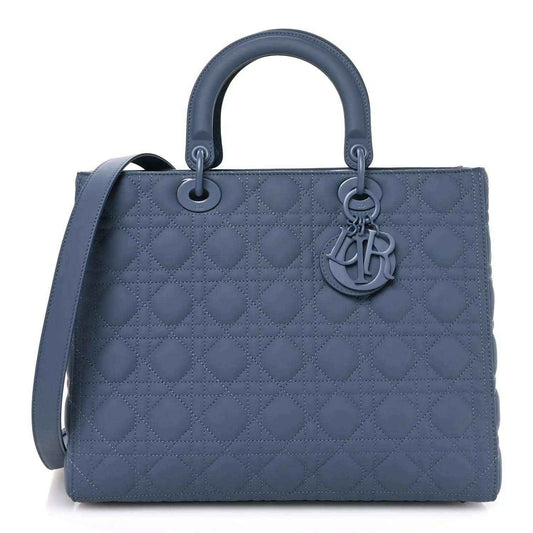 Denim blue quilted Lady Dior bag with top handles and CD charm hardware