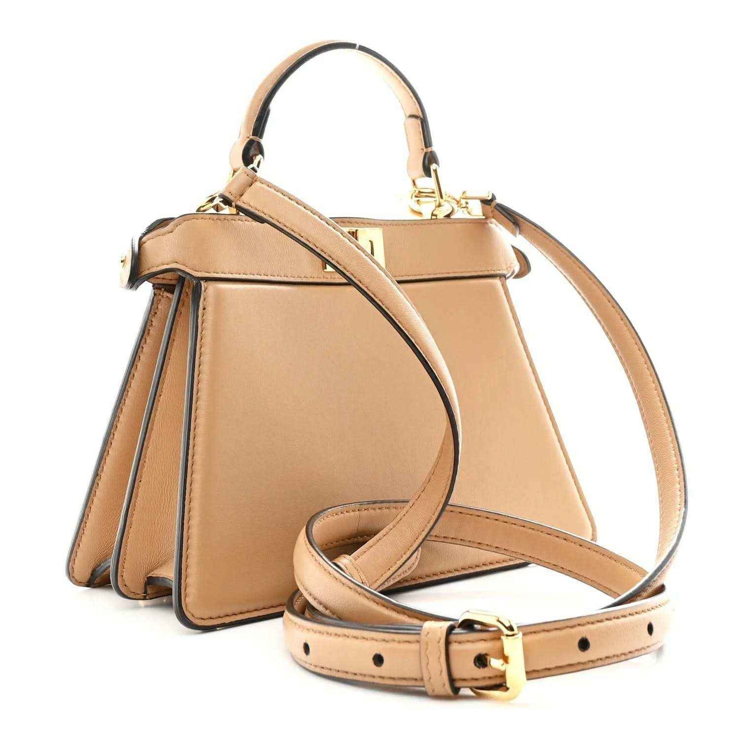 Tan structured mini satchel with long strap, front panel clasp, and gold-tone trim